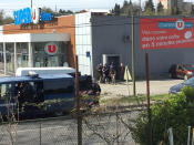 <p>Police are seen at the scene of a hostage situation in a supermarket in Trèbes, Aude, France March 23, 2018 in this picture obtained from a social media video. (Photo: La Vie a Trebes/via Reuters) </p>