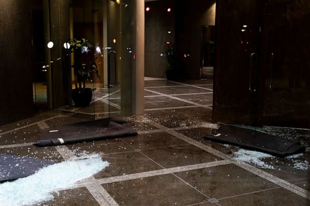 PHOTO: Broken glass remains on the floor at the Old National Bank on April 10, 2023 in Louisville, Ky. (Michael Swensen/Getty Images)