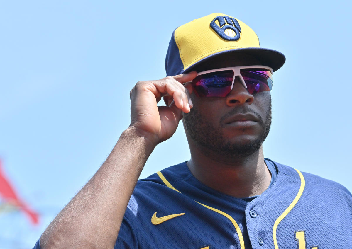 Lorenzo Cain applauds his Brewers teammates for taking a stand