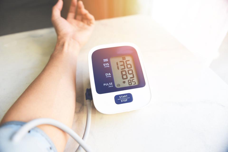 Man's blood pressure being checked