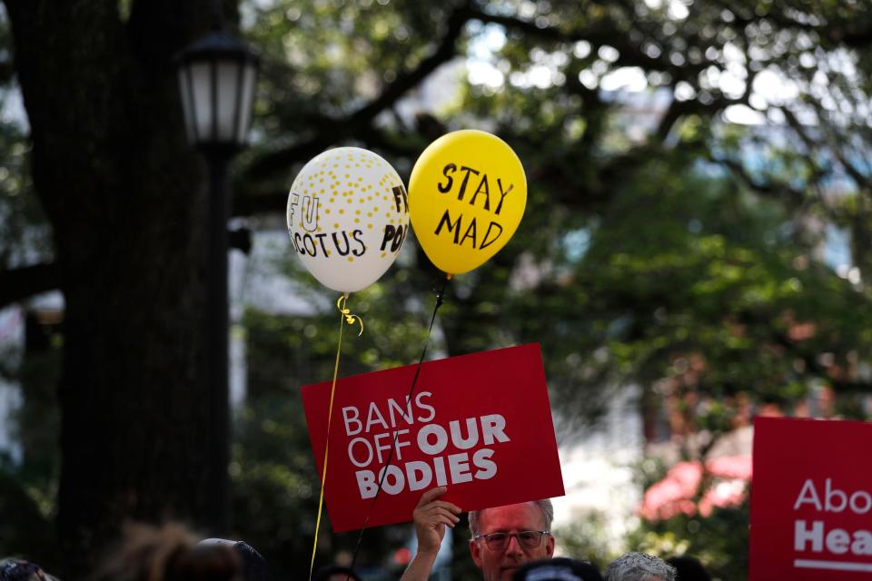 Balloons and signs at Friday's abortion rights rally.