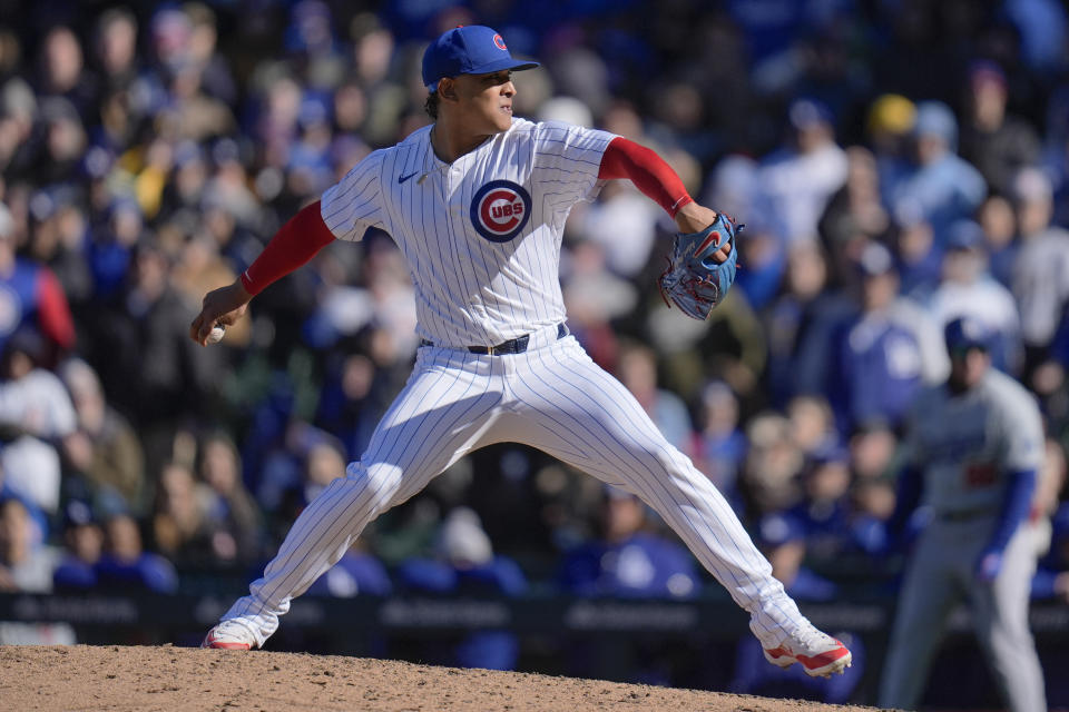 Chicago Cubs pitcher Adbert Alzolay throws against the Angeles Dodgers during the ninth inning of a baseball game Friday, April 5, 2024, in Chicago. (AP Photo/Erin Hooley)