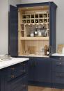 <p>In a daring navy hue, this pantry cupboard is sure to wow guests popping over for drinks. Whether you're storing bottles, books or crystal glasses, it's the perfect nook for keeping everything tidy and neat. Cocktail night, anyone?</p><p> • See more from the <a href="https://www.homebase.co.uk/kitchens/kitchen-brands/country-living.list" rel="nofollow noopener" target="_blank" data-ylk="slk:Country Living Kitchens at Homebase;elm:context_link;itc:0;sec:content-canvas" class="link ">Country Living Kitchens at Homebase</a></p>