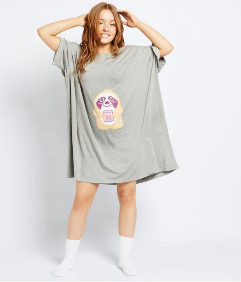 Model in sloth Oodie sleep tee