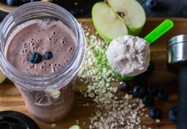 <p>Angelika Heine / Getty Images</p> Breakfast smoothie with fresh blueberries, apples, oatmeal and whey protein powder