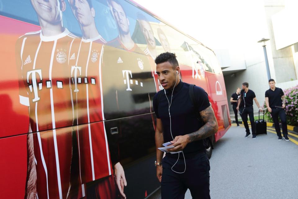 <p>Corentin Tolisso of FC Bayern Muenchen prepares to board the team bus after arriving at Jet Quay Private Terminal ahead of the International Champions Cup on July 23, 2017 in Singapore. </p>