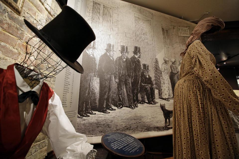 This photo taken Oct. 31, 2013 shows a of how slaves were dressed for sale, at the Freedom House Museum in Alexandria, Va. A small museum across the Potomac River from the nation's capital is connected to the story depicted in the new movie “12 Years a Slave.” The Freedom House Museum is at the site where a major slave trader once operated _ the same slave trader who sold Solomon Northrup into slavery after the free man's abduction. The movie is drawing renewed interest from historians and visitors in this Virginia city’s role in the slave trade. (AP Photo/Alex Brandon)