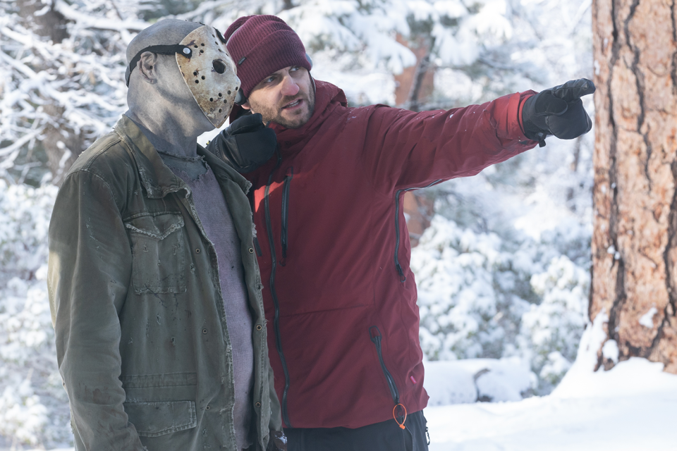 Vincente DiSanti, right, speaks with Jason stunt double Bryan Forrest, left, on the set of "Never Hike Alone," a "Friday the 13th" fan film.