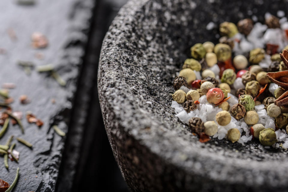 Different colored peppercorns.