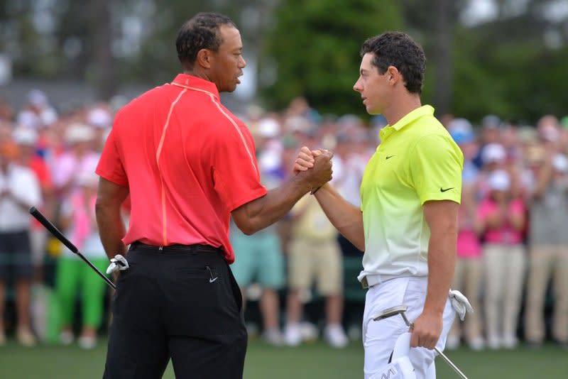 Tiger Woods (L) and Rory McIlroy announced the foundation of TGL, a new, tech-infused golf league, in 2022. File Photo by Kevin Dietsch/UPI