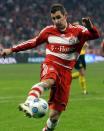 FILE PHOTO: Munich's Klose scores a goal against Borussia Dortmund during their German Bundesliga first division soccer match in Munich