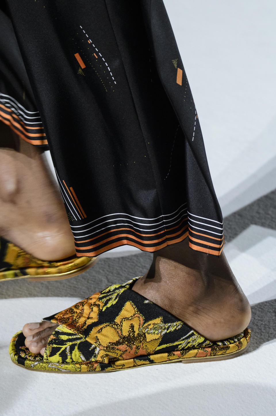 <p><i>Orange floral embroidered sandals from the SS18 Dries Van Noten collection. (Photo: ImaxTree) </i></p>