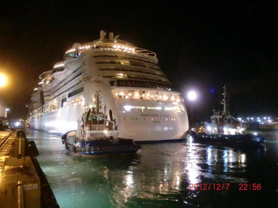 the Serenade of the Seas in the water at night