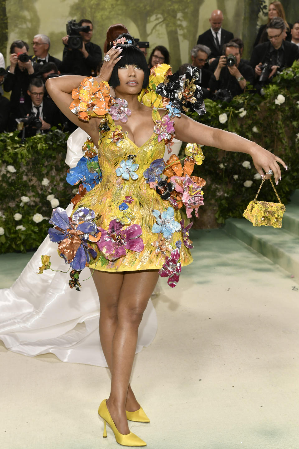 Nicki Minaj llega a la gala benéfica del Instituto del Vestido del Museo Metropolitano de Arte para celebrar la inauguración de la exposición "Sleeping Beauties: Reawakening Fashion" el lunes 6 de mayo de 2024, en Nueva York. (Foto Evan Agostini/Invision/AP)