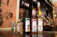 Bottles of Arak and wine from the Three Brothers distillery are seen at a bar in Badaro