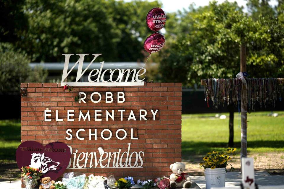 <p>Wu Xiaoling/Xinhua via Getty</p> This photo taken on May 24, 2023 shows flowers and toys placed to mourn for victims of a school mass shooting at the former Robb Elementary School in Uvalde, Texas, the United States