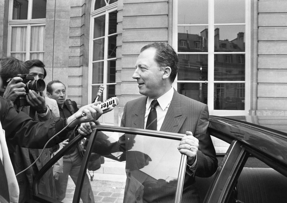 FILE - Jacques Delors leaving Hotel Matignon, Paris on July 19, 1984. Delors, a Paris bank messenger’s son who became the visionary and builder of a more unified Europe in his momentous decade as chief executive of the European Union, has died in Paris, his daughter Martine Aubry said Wednesday Dec. 27, 2023. He was 98. (AP Photo/William Stevens, File)