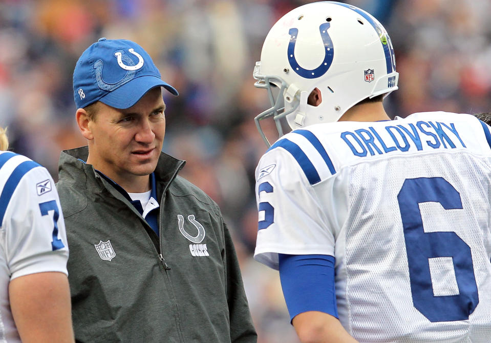 FOXBORO, MA - DECEMBER 4: Peyton Manning #18 of the Indianapolis Colts has words with quarterback Dan Orlovsky #6 of the Indianapolis Colts on December 4, 2011 in Foxboro, Massachusetts. (Photo by Jim Rogash/Getty Images)