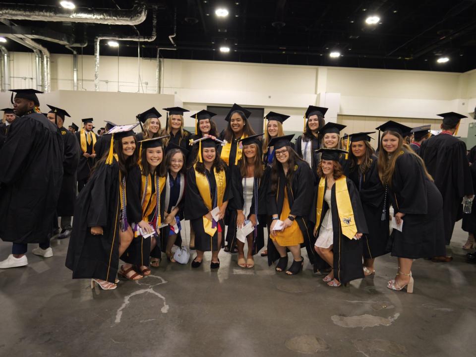 Members of the Class of 2022 at Framingham State University are all smiles at their commencement ceremony Sunday at the DCU Center in Worcester.