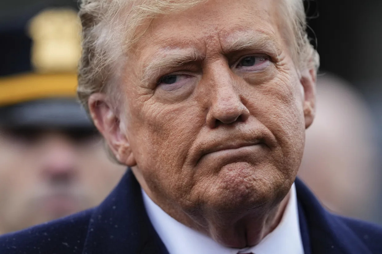 Former President Donald Trump reacts during a news conference after attending the wake of New York City police officer Jonathan Diller, Thursday, March 28, 2024, in Massapequa Park, N.Y. Diller was shot and killed Monday during a traffic stop, the city's mayor said. It marked the first slaying of an NYPD officer in two years. (AP Photo/Frank Franklin II)