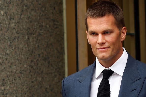 2015:  Quarterback Tom Brady of the New England Patriots leaves federal court after contesting his four game suspension with the NFL on August 31, 2015 in New York City. U.S. District Judge Richard Berman had required NFL commissioner Roger Goodell and Brady to be present in court when the NFL and NFL Players Association reconvened their dispute over Brady's four-game Deflategate suspension. The two sides failed to reach an agreement to their seven-month standoff.  (Photo by Spencer Platt/Getty Images)