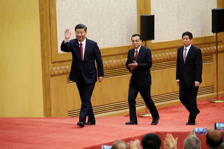 China's new Politburo Standing Committee members (L-R) Xi Jinping, Li Keqiang and Li Zhanshu, arrive to meet with the press at the Great Hall of the People in Beijing, China October 25, 2017. REUTERS/Jason Lee