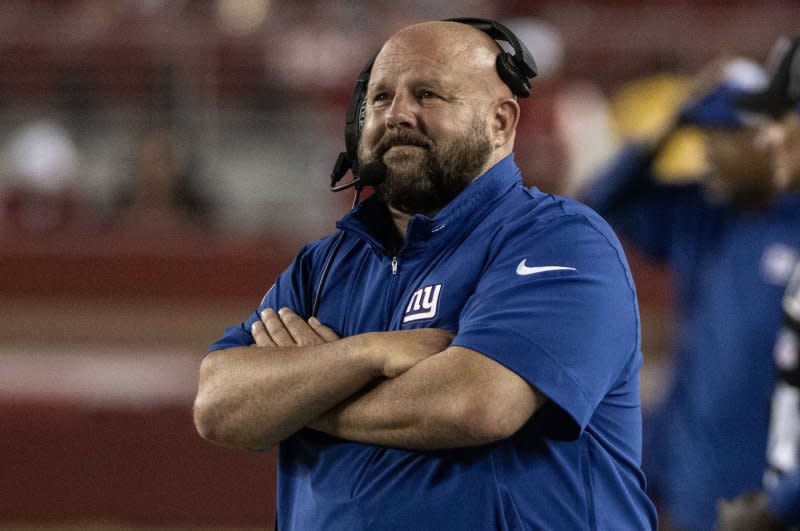 New York Giants coach Brian Daboll declined to name a starting quarterback for a Week 17 game against the Los Angeles Rams. File Photo by Terry Schmitt/UPI