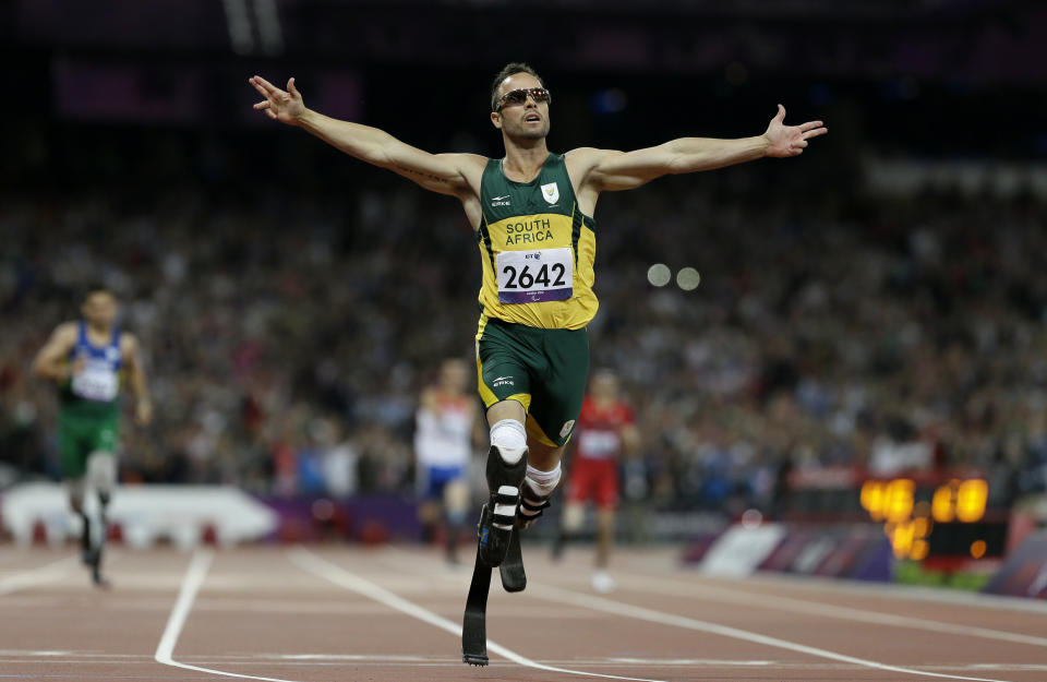 South Africa's Oscar Pistorius wins gold in the men's 400-meter T44 final at the 2012 Paralympics, Saturday, Sept. 8, 2012, in London. (AP Photo/Kirsty Wigglesworth)