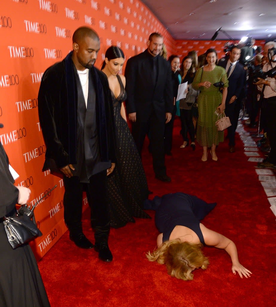 Amy Schumer falling in front of Kim and Kanye