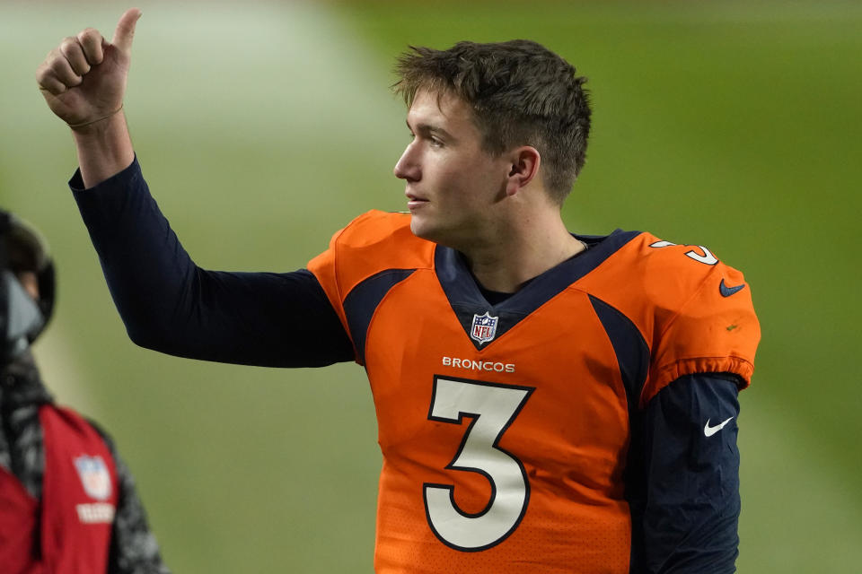 Denver Broncos quarterback Drew Lock (3) celebrates after an NFL football game against the Miami Dolphins, Sunday, Nov. 22, 2020, in Denver. The Broncos won 20-13. (AP Photo/Jack Dempsey)