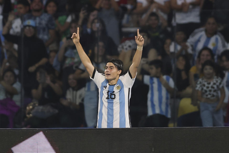 Argentina's Luka Romero celebrates scoring his side's 2nd goal against Guatemala during a FIFA U-20 World Cup Group A soccer match at the Madre De Ciudades stadium in Santiago del Estero, Argentina, Tuesday, May 23, 2023. (AP Photo/Nicolas Aguilera)