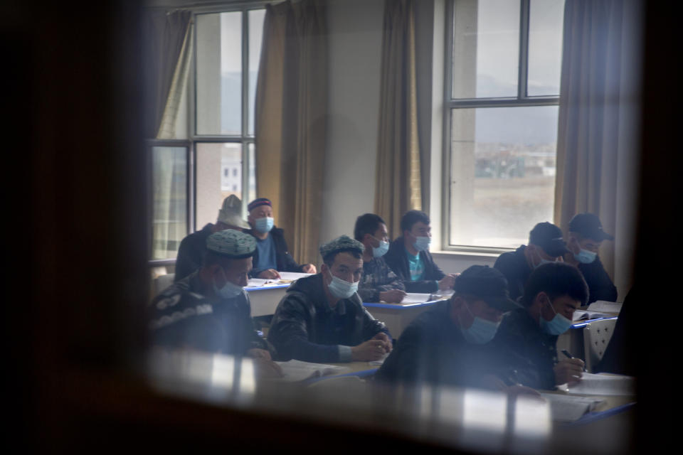 Students training to become imams recite verses from the Quran at the Xinjiang Islamic Institute in Urumqi, the capital of China's far west Xinjiang region, during a government organized visit for foreign journalists on April 21, 2021. Four years after Beijing's brutal crackdown on largely Muslim minorities native to Xinjiang, Chinese authorities are dialing back the region's high-tech police state and stepping up tourism. But even as a sense of normality returns, fear remains, hidden but pervasive. (AP Photo/Mark Schiefelbein)