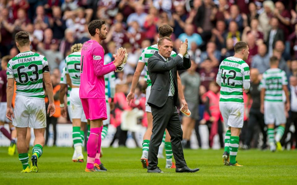 Celtic react to a shock defeat at Tynecastle on Saturday  - PA