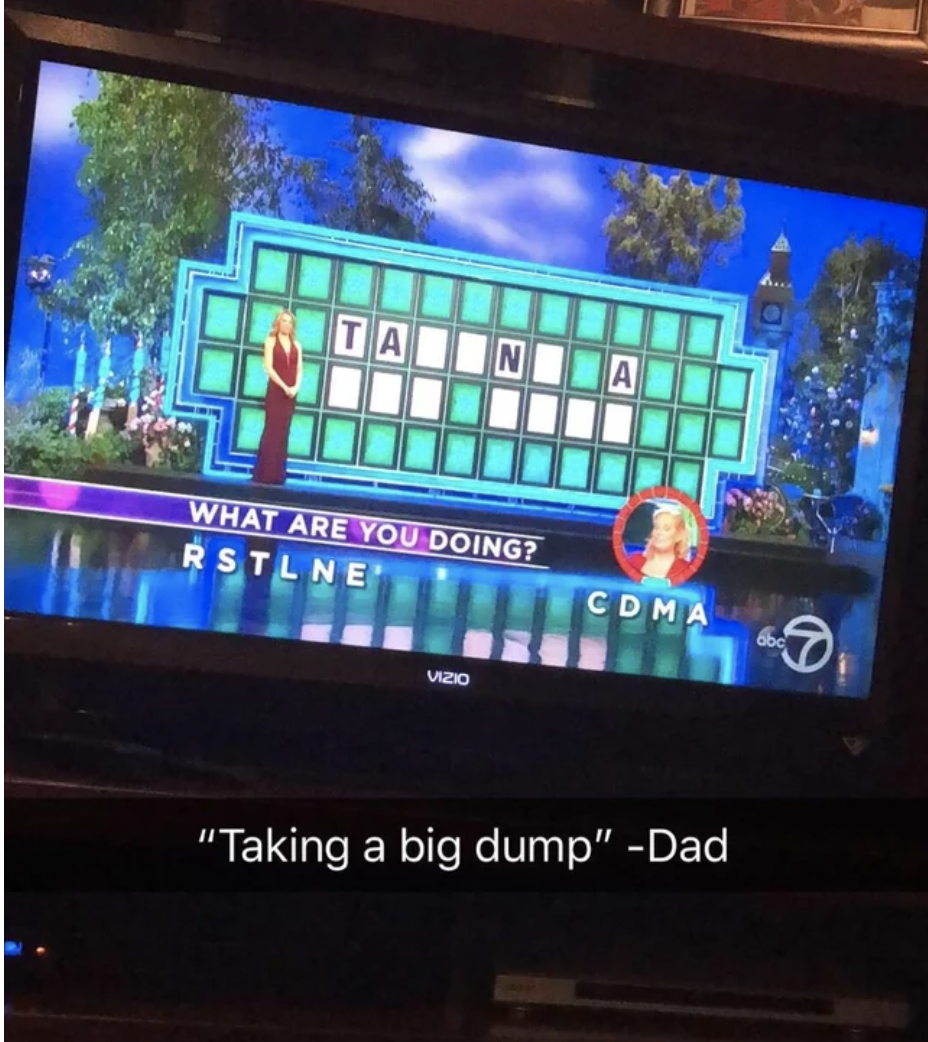 Screenshot of Wheel of Fortune letters, with hint question "What are you doing?" along with Dad's answer — "Taking a big dump” — in a caption underneath