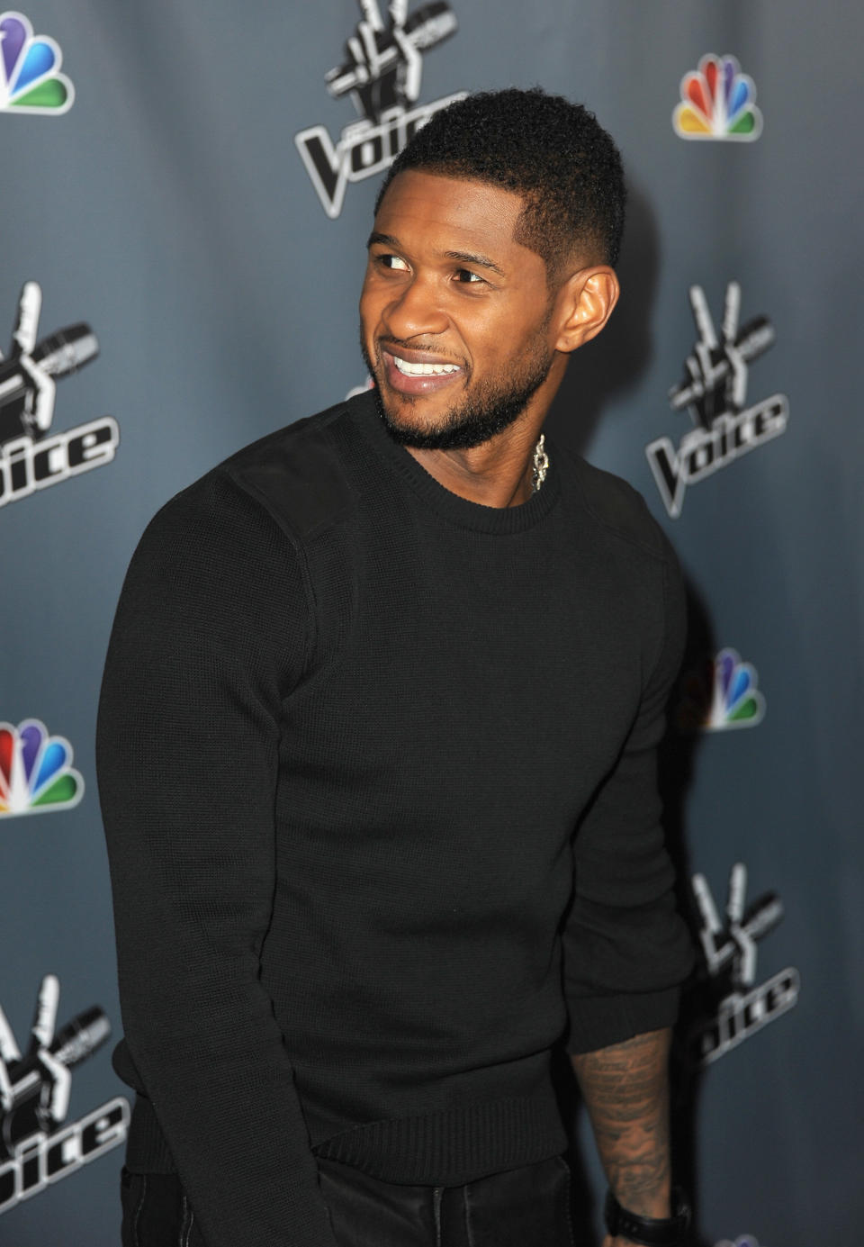 HOLLYWOOD, CA - MARCH 20:  Singer Usher arrives at the screening of NBC's 'The Voice' Season 4 at TCL Chinese Theatre on March 20, 2013 in Hollywood, California.  (Photo by Kevin Winter/Getty Images)