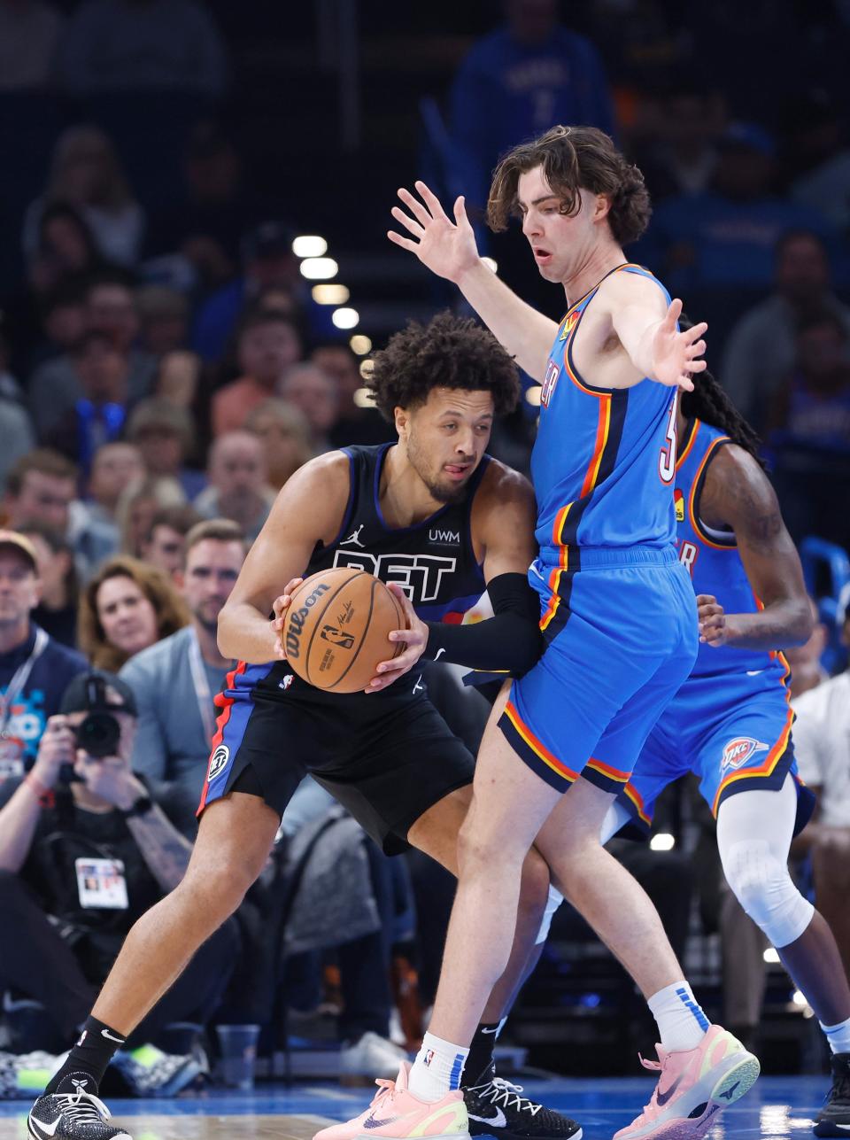 Detroit Pistons guard Cade Cunningham drives against Oklahoma City Thunder guard Josh Giddey during the second quarter at Paycom Center in Oklahoma City, Okla., Oct. 30, 2023.