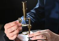 Darwin Family Microscope, owned and used by the English naturalist, Charles Darwin, demonstrated ahead of auction at Christie's, London