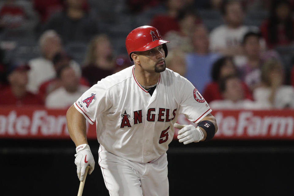 Los Angeles Angels' first baseman Albert Pujols is the third player in MLB's 2,000-RBI club, joining Hank Aaron and Alex Rodriguez. (AP Photo/Jae C. Hong)