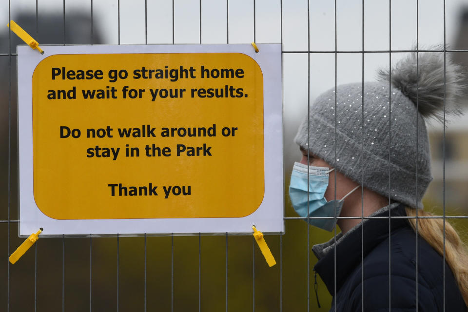 People take part in coronavirus surge testing on Clapham Common, south London. Thousands of residents have queued up to take coronavirus tests at additional facilities set up after new cases of the South African variant were found in two south London boroughs. 44 confirmed cases of the variant have been found in Lambeth and Wandsworth, with a further 30 probable cases identified. Picture date: Wednesday April 14, 2021. (Photo by Kirsty O'Connor/PA Images via Getty Images)