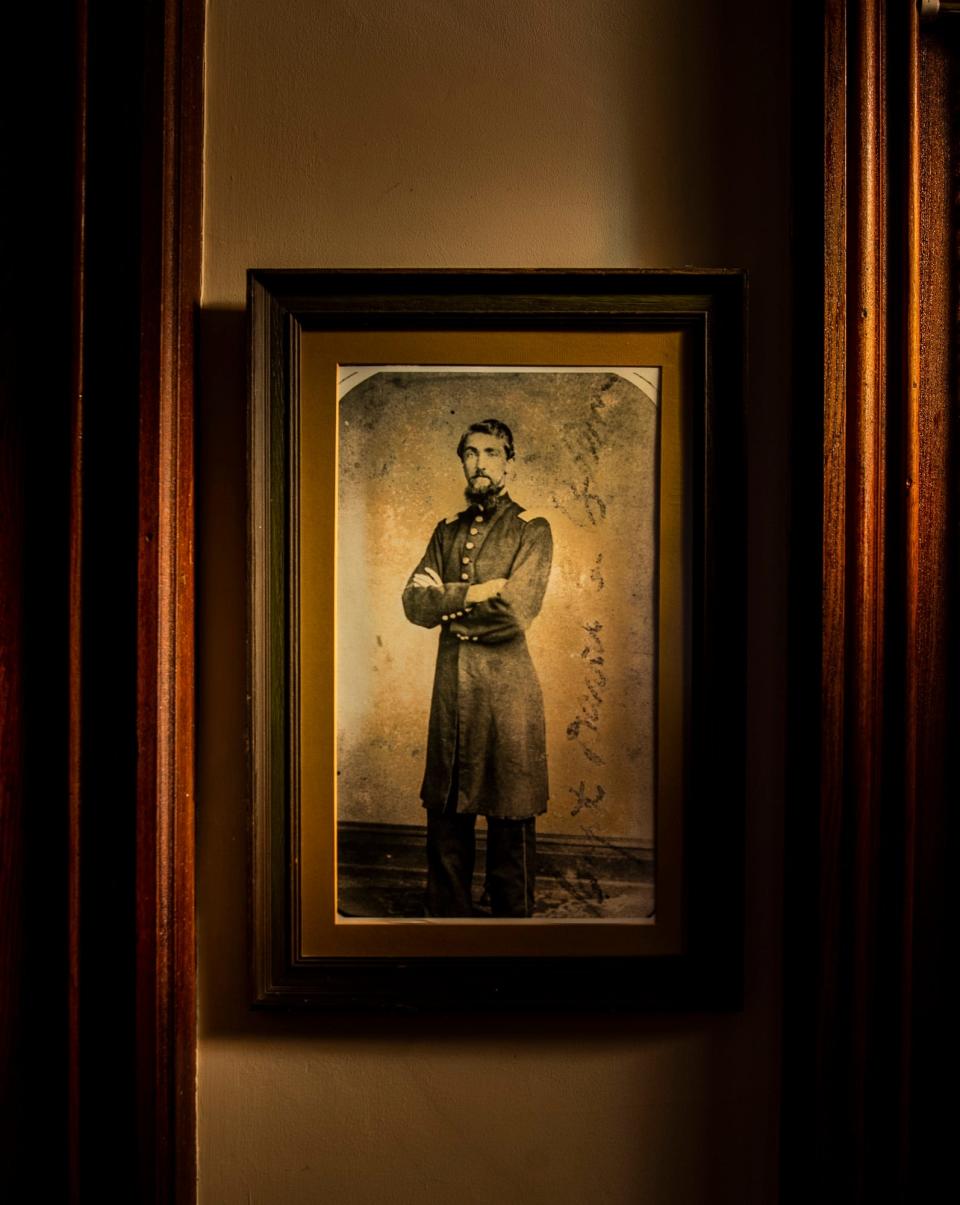 A picture of Capt. David Enoch Beem is displayed inside the 3,500 square foot house he built in Spencer in 1874.