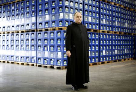 Father Valentin, one of the 17 shareholders of the 'Kloster Andechs' brewery, poses for a picture in Andechs near Munich, Germany, April 19, 2016. REUTERS/Michaela Rehle