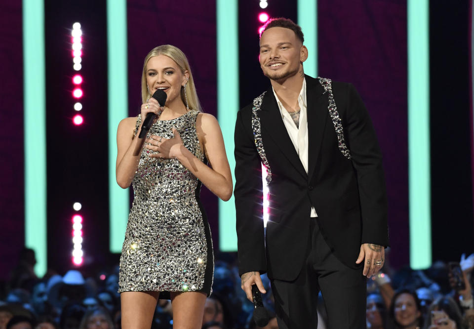 Hosts Kelsea Ballerini, left, and Kane Brown speak at the CMT Music Awards on Sunday, April 2, 2023, at the Moody Center in Austin, Texas. (Photo by Evan Agostini/Invision/AP)