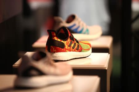 Adidas sport shoes are seen before the company's annual news conference in Herzogenaurach, Germany March 14, 2018. REUTERS/Michael Dalder