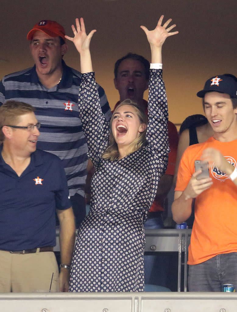 <p>His biggest fan! The model cheered on her fiancè, Houston Astros pitcher Justin Verlander, and celebrated as the team beat the Dodgers on Wednesday to tie the World Series at one game apiece. (Photo: Jerritt Clark/Getty Images) </p>