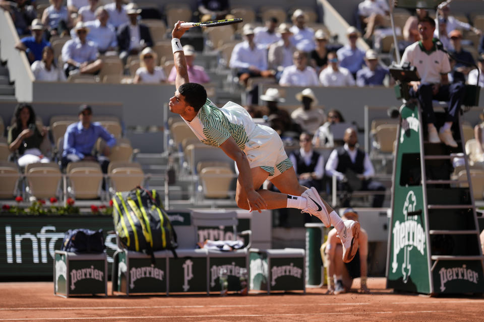 Spain's Carlos Alcaraz plays a shot against Japan's Taro Daniel during their second round match of the French Open tennis tournament at the Roland Garros stadium in Paris, Wednesday, May 31, 2023. (AP Photo/Thibault Camus)