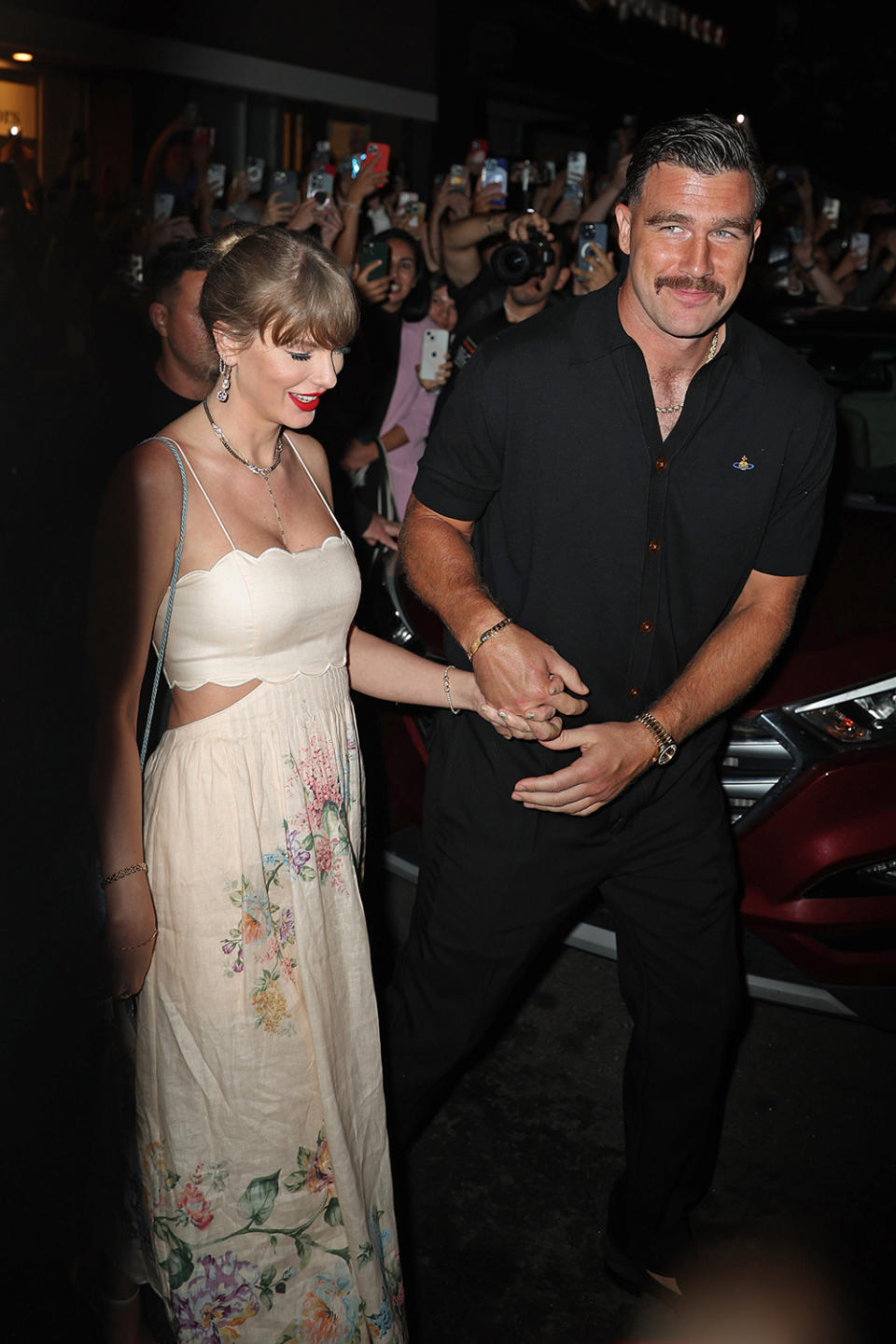 Taylor Swift and Travis Kelce are seen on Sept. 7 in New York, floral, Zimmermann, Karen Elson, wedding, coquette