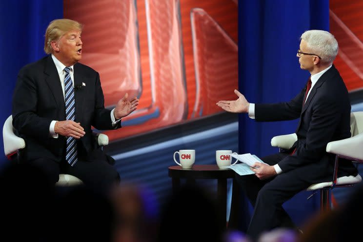 Trump talks to Cooper during a town hall event in Columbia, S.C., on Feb. 18, 2016. (Spencer Platt/Getty Images)