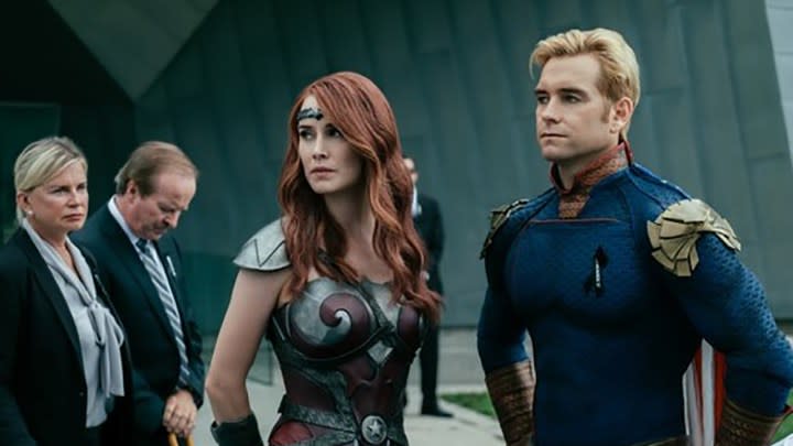 Queen Maeve and Homelander looking in the same direction with annoyed expressions in The Boys.