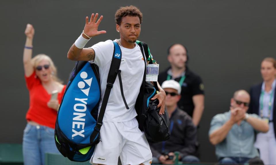 Paul Jubb waves to the crowd after his defeat to Nick Kyrgios