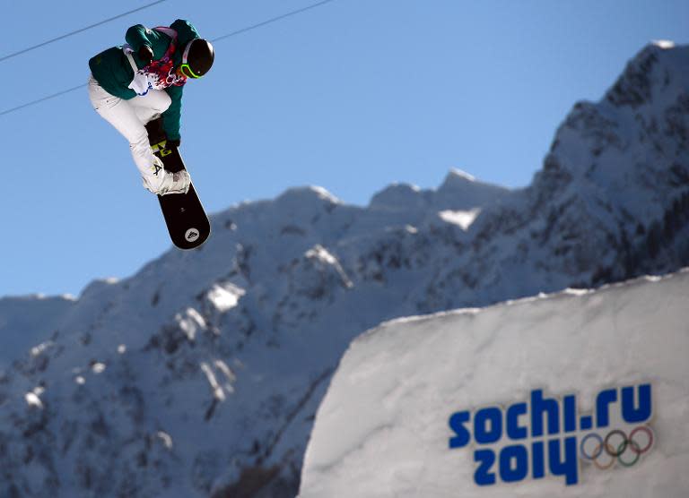 Torah Bright competes in the Women's Snowboard Slopestyle qualification at the Rosa Khutor Extreme Park during the Sochi Winter Olympics on February 6, 2014